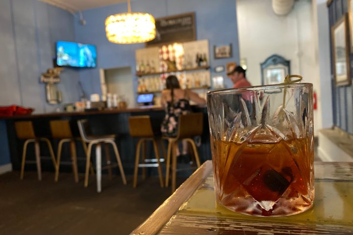 a glass of beer on a table