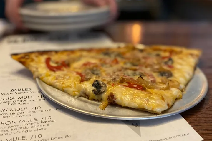 a pizza sitting on top of a table