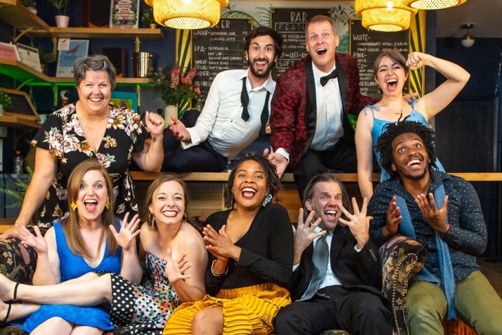 a group of people posing for the camera