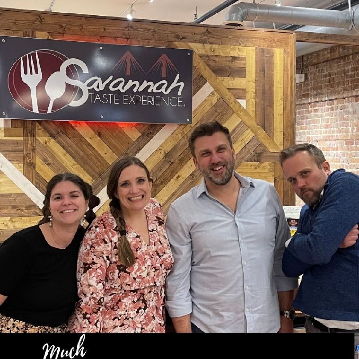 a group of people posing for a photo