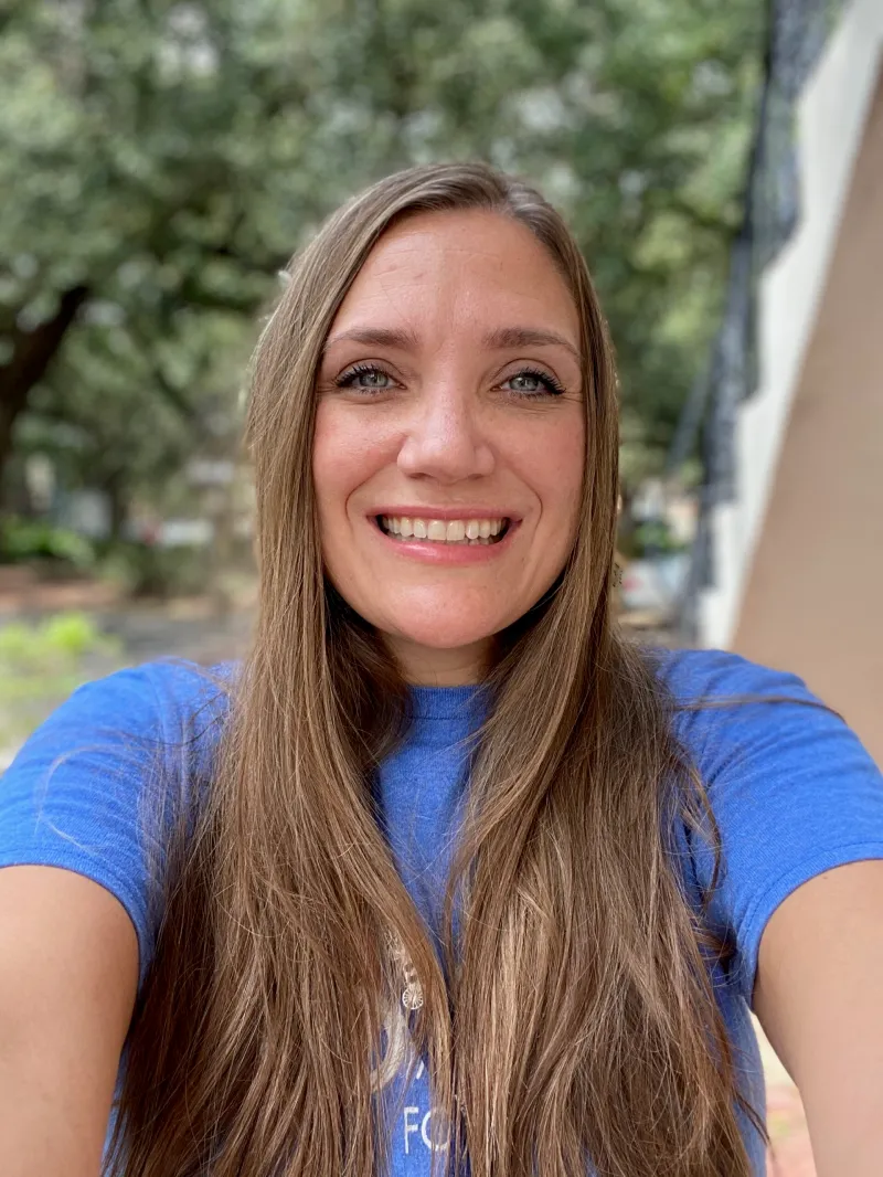 Juli Coble Kastl Headshot a person wearing a blue shirt