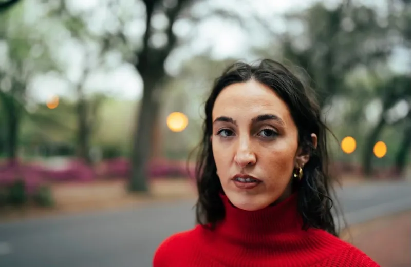 Meagan Johnson ID a woman standing in a street