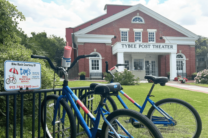 a bicycle parked in front of a building