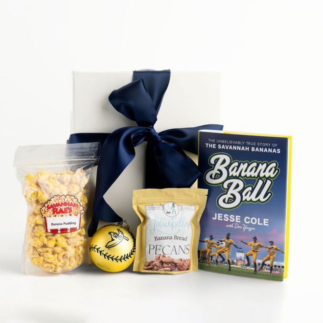 Gift box with blue ribbon, book, banana ball, pecans, and banana popcorn.